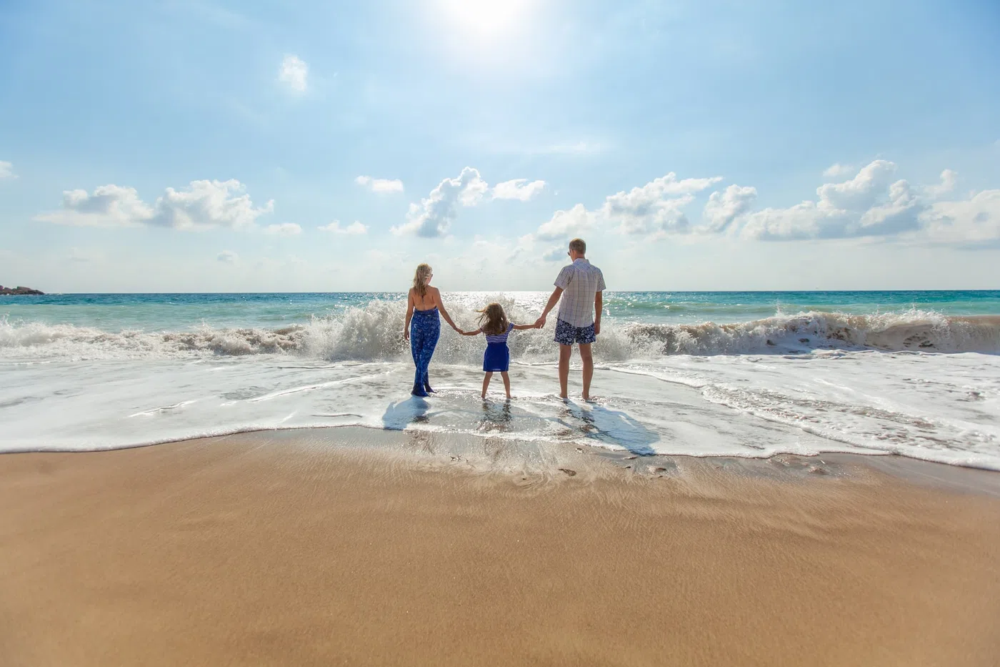 Family relaxing beside the coast in Negombo