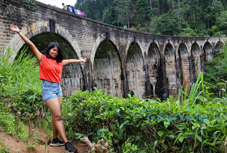 Nine Arch Bridge surrounded by greenery in Ella
