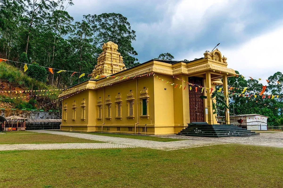 Sri Bhakta Hanuman Temple against the hills of Ramboda