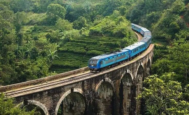 Nine Arch Bridge surrounded by greenery in Ella